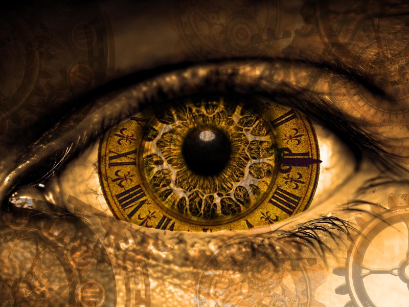 An eye with a clock face as the iris, blending time and vision.