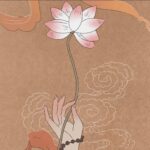 A delicate hand holding a lotus flower against a textured background.