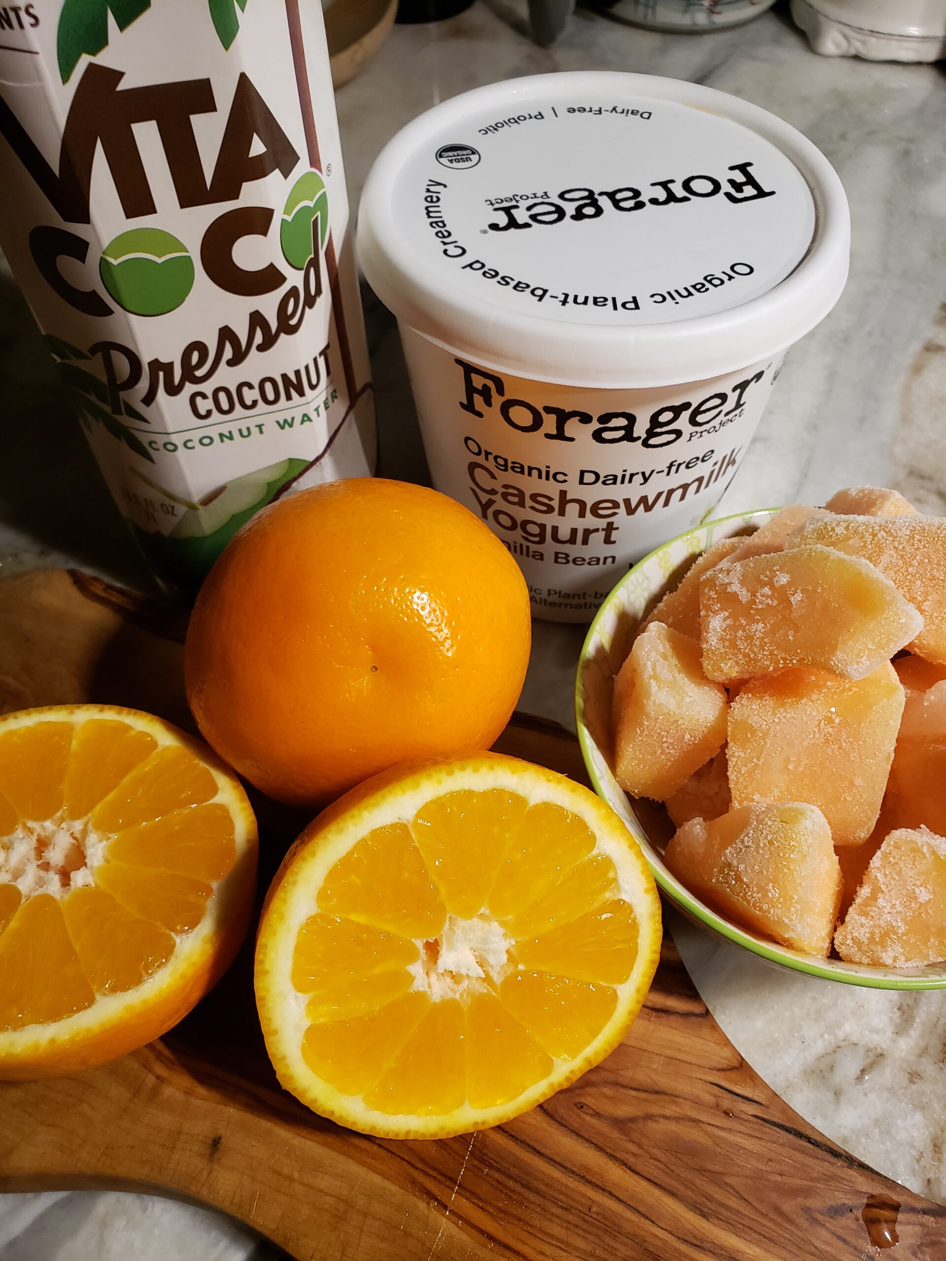 Fresh oranges with coconut oil and Forager yogurt.